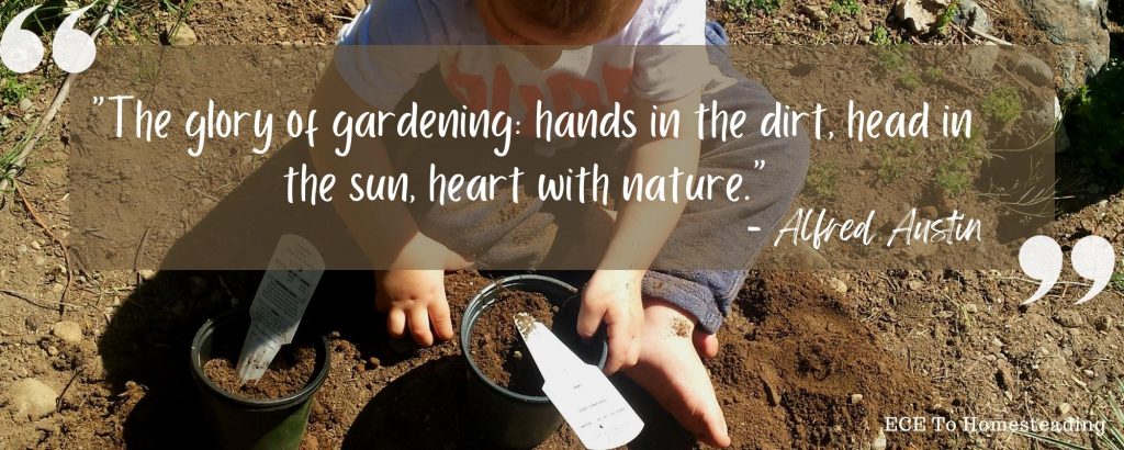 toddler playing in the dirt with plant pots